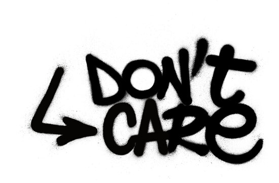 graffiti don't care text sprayed in black over white