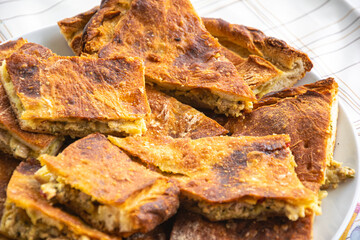 A close up of freshly baked Galician empanada slices The Delicious Taste of Spanish Tradition