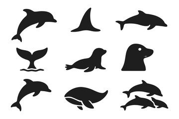 Fototapeta premium Marine Mammal Silhouettes. Solid style icons of Marine Mammals: dolphin silhouette, orca dorsal fin, porpoise profile, whale tail,