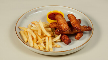 Fries plate and strips with ketchup