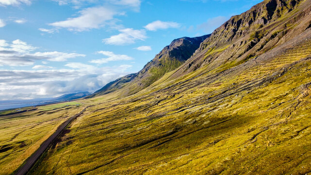 Aerial Drone View of Mountains and Coastal Road near Sau&eth;&aacute;rkr&oacute;kur, Iceland