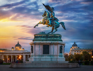 Statue of Archduke Charles of Vienna, Austria. Evening view of the city center of Vienna, Austria.