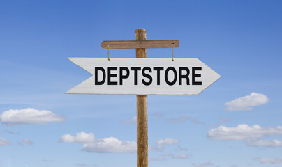 White wooden arrow with the inscription: Deptstore