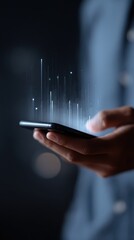 person holding smartphone with holographic charts, AI and finance analytics concept