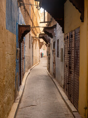 Obraz premium A small street in the medina of Fez, Morocco