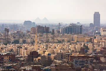 Panorama of the city of Cairo, with two pyramids on the horison (Cheops and Khafre)