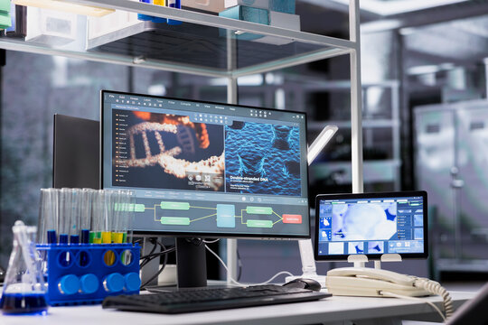PC in lab with software interface showing genetic markers associated with disease risk. Computer in laboratory used to study DNA strand mapping with genomics analysis program