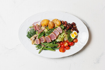Gourmet Seared Tuna Nioise Salad with Fresh Vegetables and Potatoes
