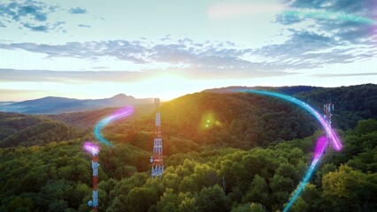 Mobile data signal animation of three communication towers in green nature landscape at sunrise