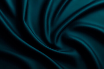 Fototapeta premium Soft dark ocean teal imperial sapphire aegean blue silk satin fabric material. Abstract brilliant smooth rich royal velvet wallpaper. Luxury elegant background. Wave line crumpled swirl. Fashion.