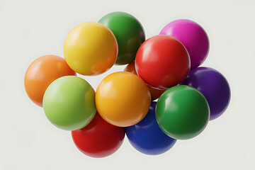 A cluster of colorful spheres in yellow, red, green, orange, and purple creates a vibrant, playful composition.