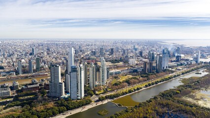 Aerial drone view of the modern skyline of Puerto Madero and surrounding cityscape in Buenos Aires, Argentina.