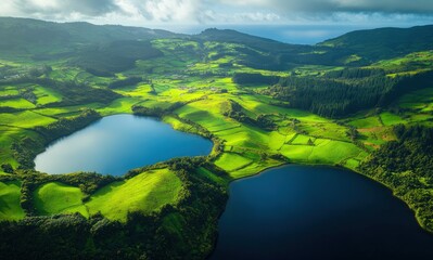 Twin lakes nestled in lush green hills, scenic view