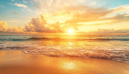 Golden sunrise over a tranquil beach with gentle waves