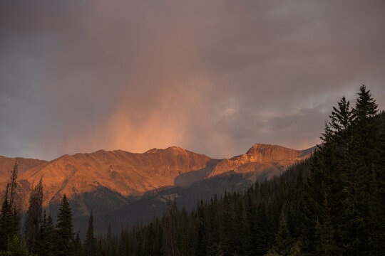 Twilight rain over distant mountains