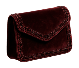 Handcrafted velvet clutch featuring beaded accents and a magnetic closure.