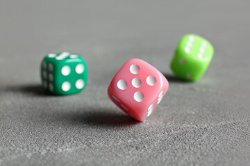Different dices on grey background