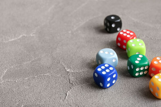Different dices on grey background