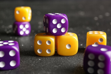Different dices on dark background