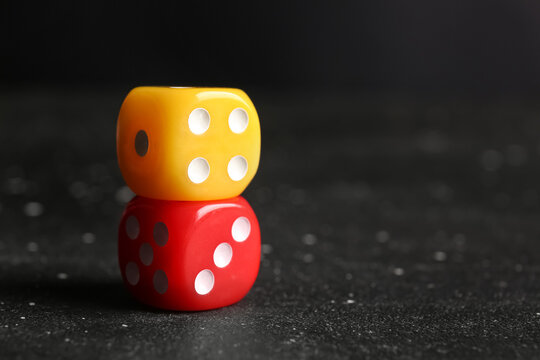 Different dices on dark background