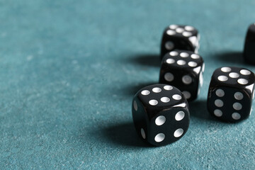 Black dices on color background