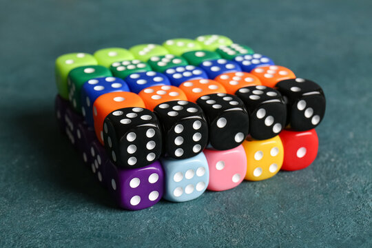 Many different  dices on color background
