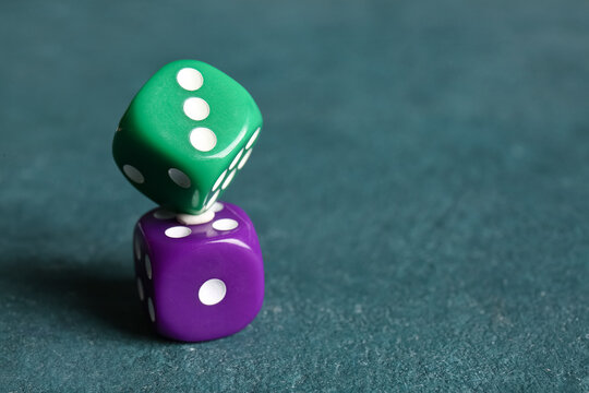 Different dices on color background
