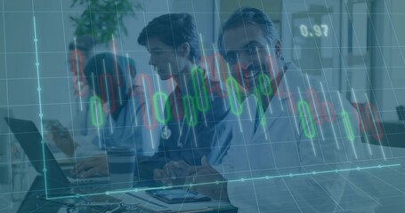 Analyzing medical team working on laptops and charts in clinical office with candlestick charts