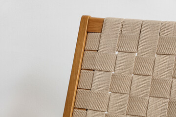 Texture of woven chair on white background, closeup