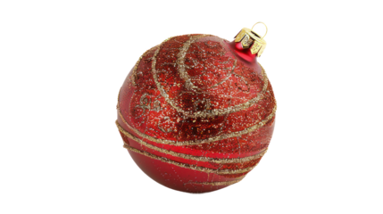 A shiny red ornament with sparkling gold swirls perfect for holiday decorating and celebrating . /cut out PNG file/.