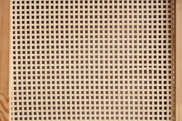 Wicker texture on brown background, closeup