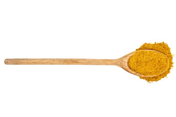 Spoon with spilled cumin on white background