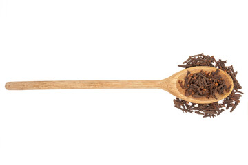 Rustic wooden spoon with whole cloves on white background