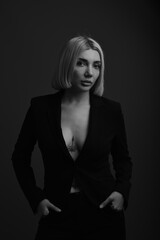 woman in black dress / jacket