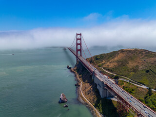 Golden Gate Bridge north tower in the fog at San Francisco Bay, city of San Francisco, California CA, USA.