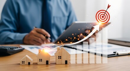 Real Estate Investment Growth Strategy and Target Achievement with Rising Graph and Wooden House Models on a Desk
