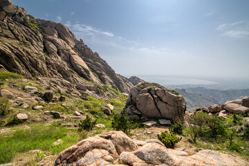 Beautiful rock formation and the sea in the background in Dazhu Mountain Scenic Area in Qingdao Shandong Province, China