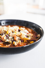 onion soup with beans corn and parmesan topping healthy homemade meal
