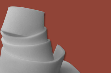 spiral curved roll of white sponge foam sheet with copy space for text