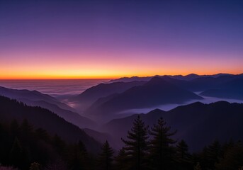 Epic twilight over a vast mountain range with valleys filled with mist and vibrant sky