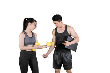 Male trainer showing workout test of his client on a clipboard, isolated on white background