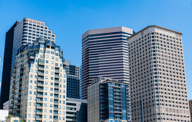 Obraz premium Skyscraper cityscape. Modern city downtown. Business city. Cityscape of skyscraper building in business district. City architecture of skyscraper. City building cityscape view. Landmark skyscrapers