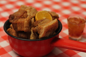 Crispy Pork Rinds with Orange Slice