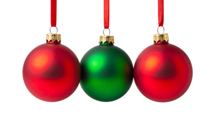 Three christmas ornaments, two red and one green, hanging from red ribbons, isolated on white background