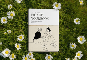 Book On Grass With Daisies Mockup PSD