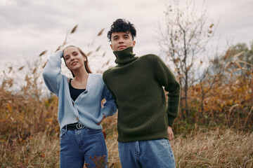 A candid outdoor moment with two friends in autumn light, showing authenticity through relaxed...