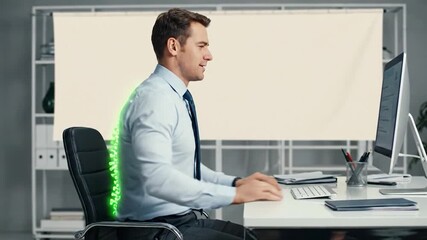 Businessman in office with glowing spine at computer, highlighting bad posture