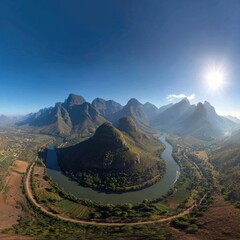 Aerial Panorama Of Winding River And Mountains