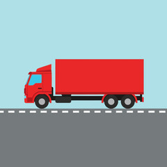 Red Cargo Truck Driving on an Asphalt Road.
