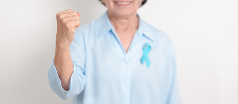Elderly with blue Ribbon for concept of blue November, November Prostate Cancer Awareness month, World Diabetes day , Men Health month, International men, Father day. Healthcare and world cancer day - Powered by Adobe